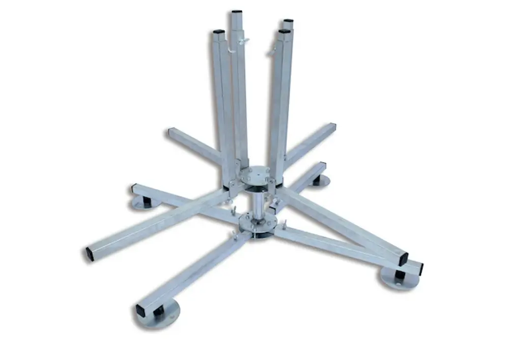 Faltbarer Abroller aus Aluminium, bestehend aus einem stabilen Standfuß mit mehreren abgewinkelten Haltestangen. Hergestellt von der Marke Roth.